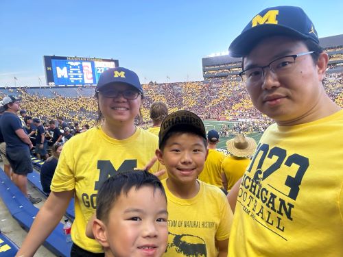 Dr. Mindy Wang and family at the U-M Football game vs. USC